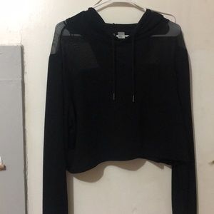 Super cute cropped black hoodie with a mesh top!